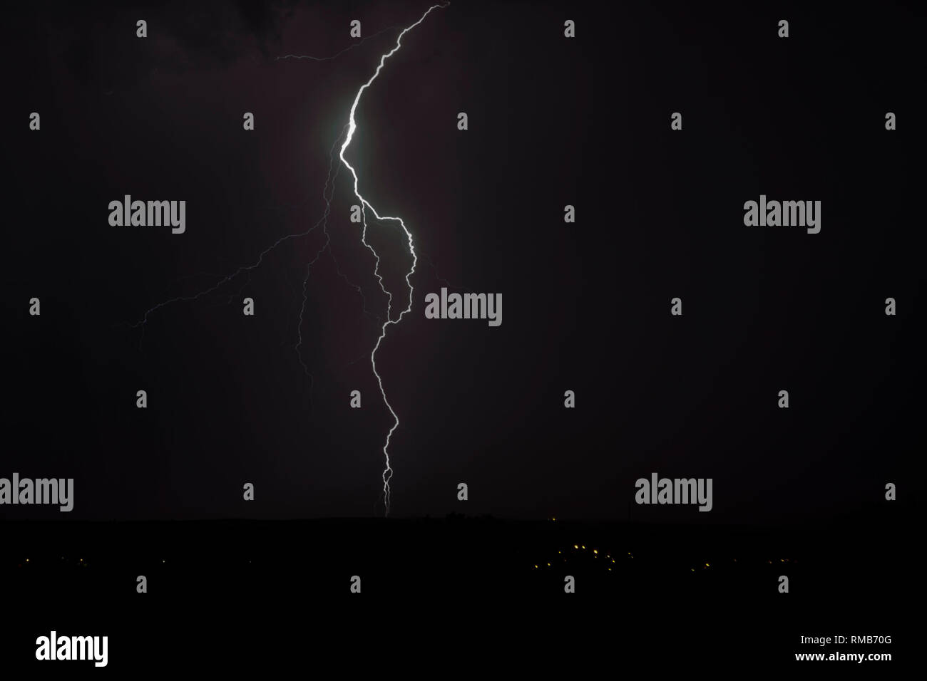 Cloud to ground lightning in night sky Stock Photo - Alamy