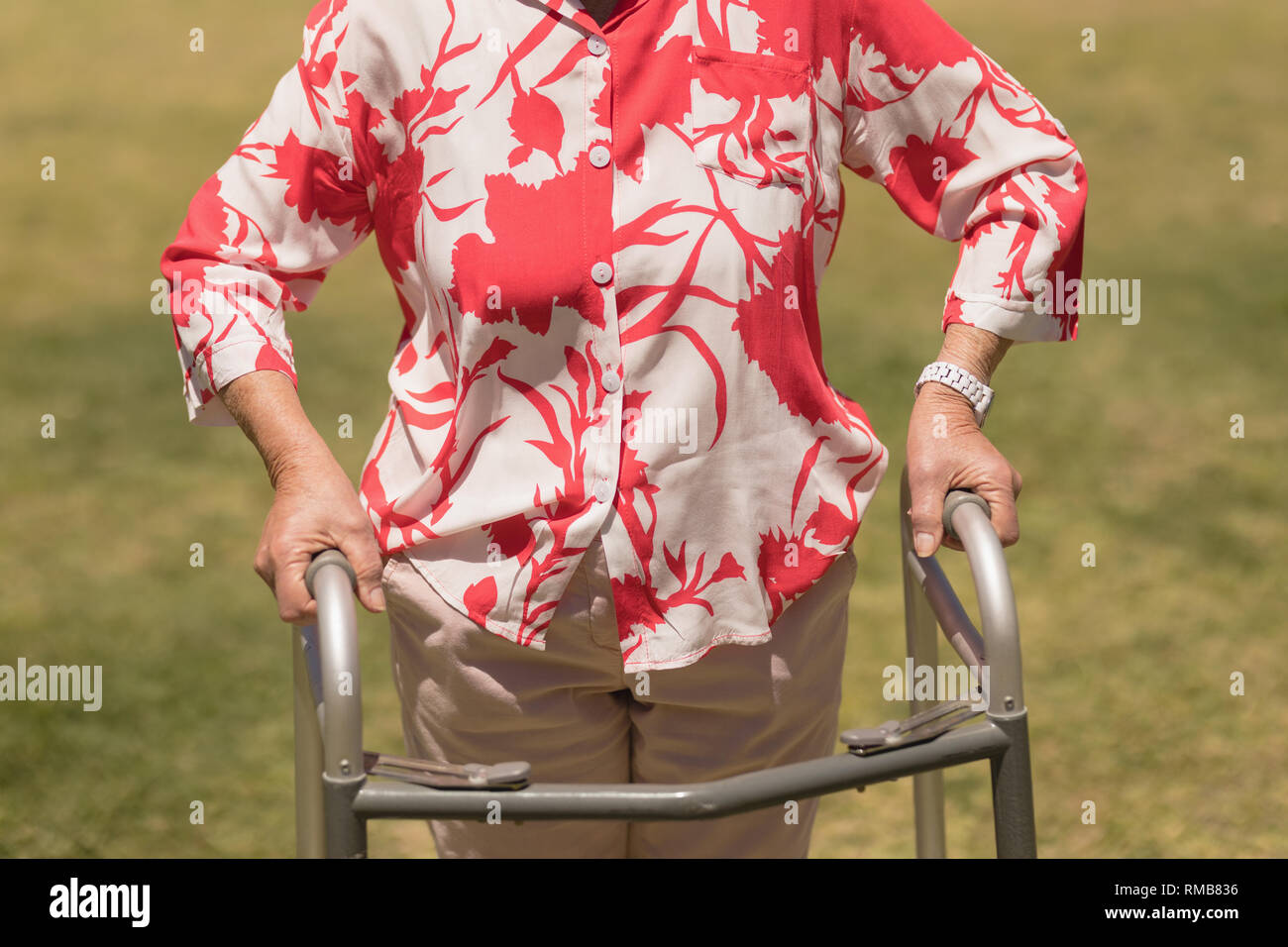 Woman with walker at hospital hi-res stock photography and images - Alamy