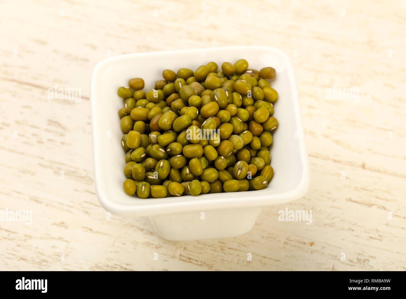Dry green beans heap over the wooden background Stock Photo Alamy