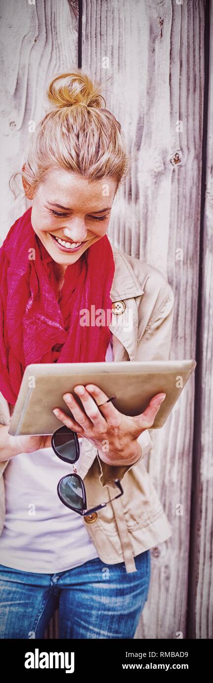 Young woman using digital tablet Stock Photo