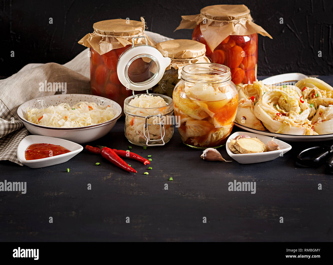 Fermented food. Vegetarian food concept. Cabbage kimchi, tomatoes