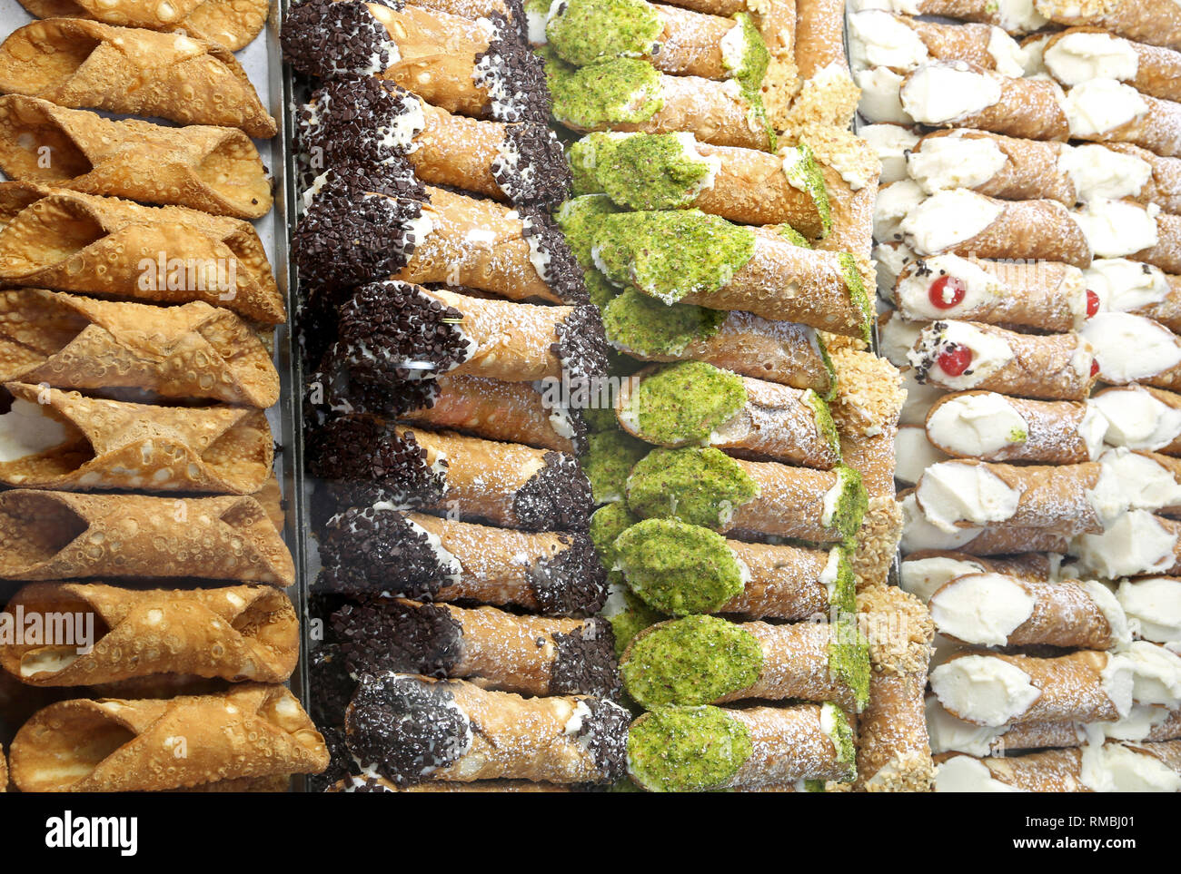 many pastries with fried dough with cream cheese for sale in Sicilian pastry Stock Photo