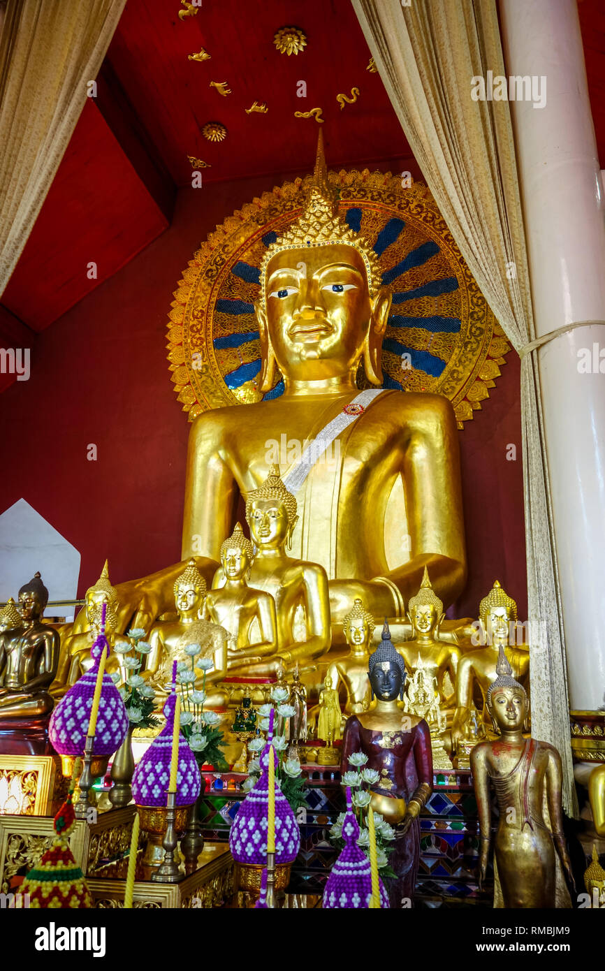 Gold buddha statue in wat phra singh temple hi-res stock photography ...