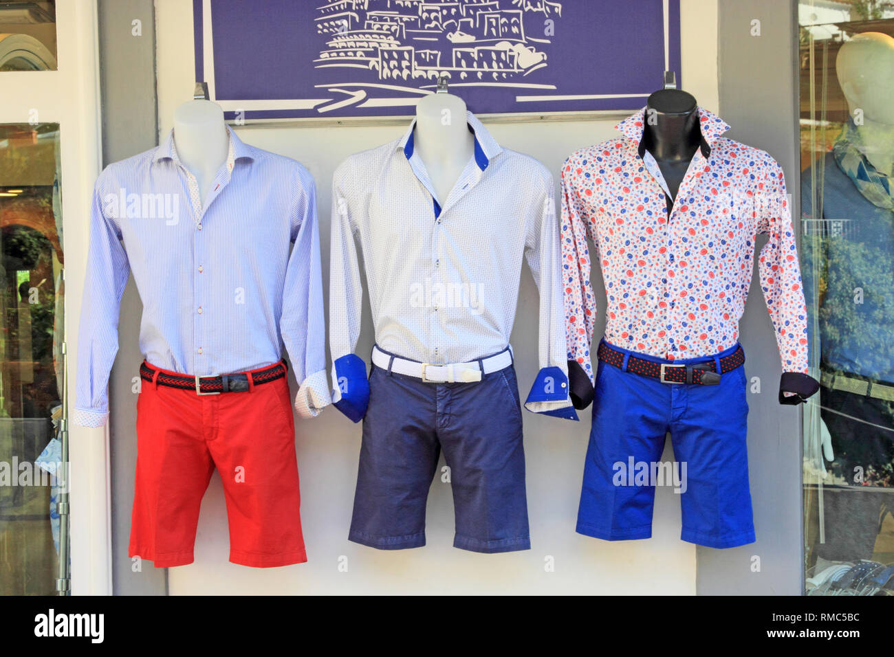 Mens shirts and shorts display Stock Photo