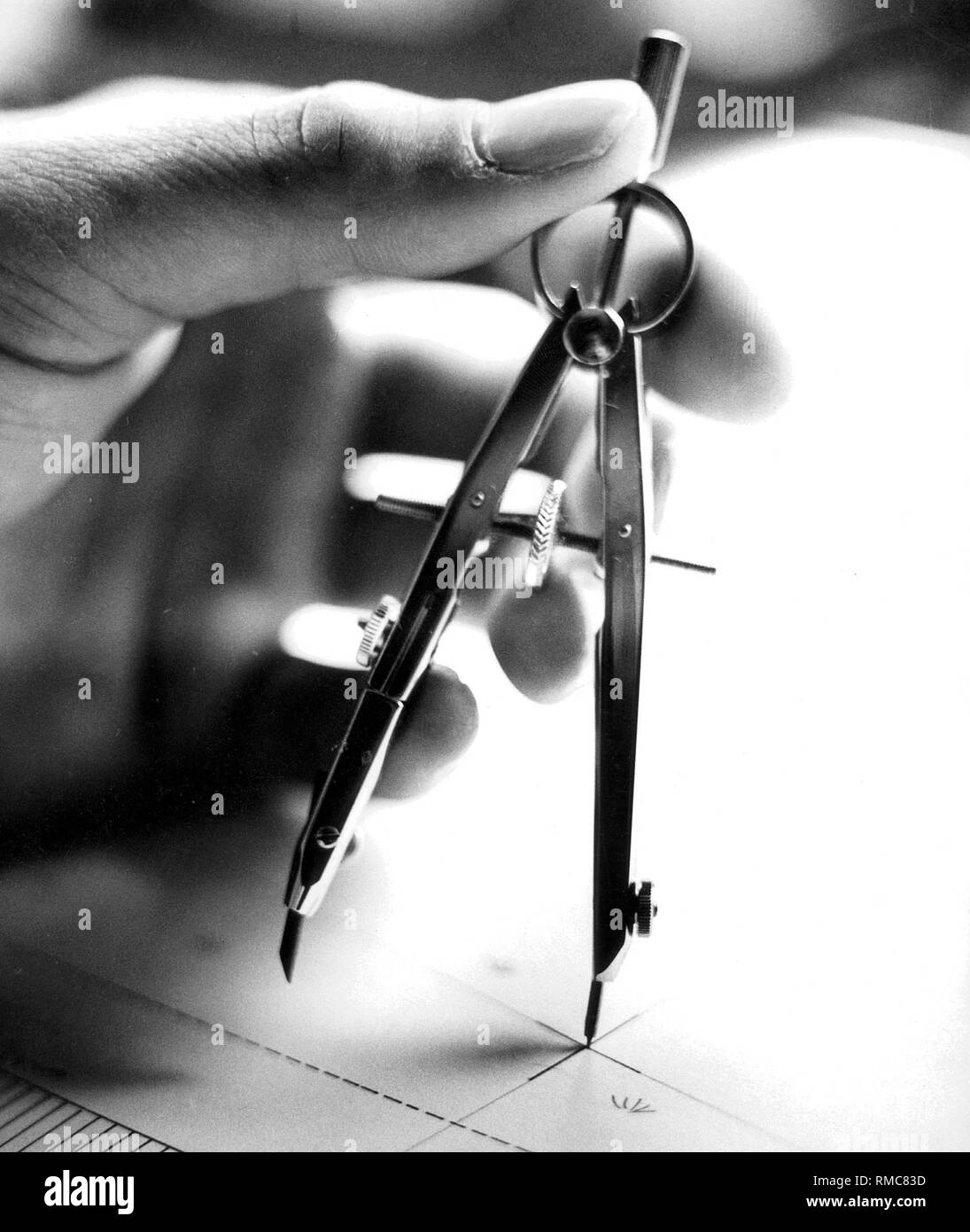 Compass on a construction plan and symbol of architecture Stock Photo ...