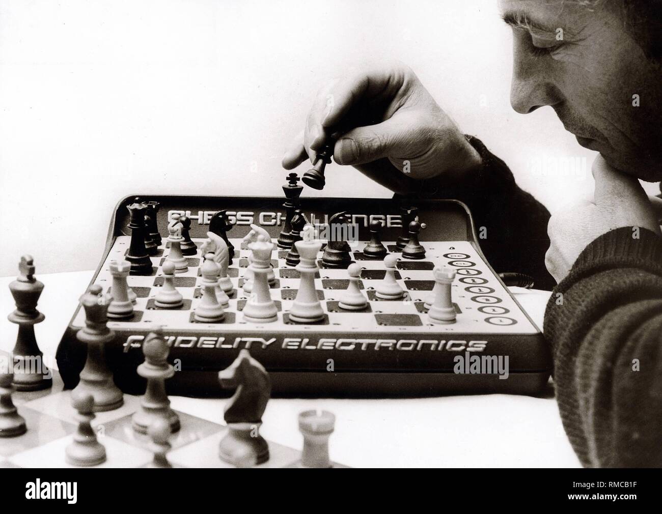 Chess game with the computer 'Chess Challenger', 1981. Stock Photo