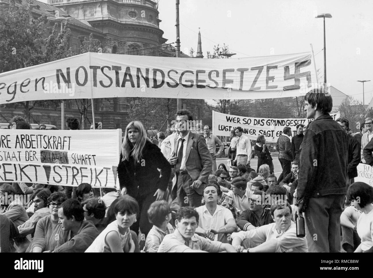 Students on the Munich Stachus in May 1968 in a sit-in against the passing of the German Emergency Acts in Bonn. Stock Photo