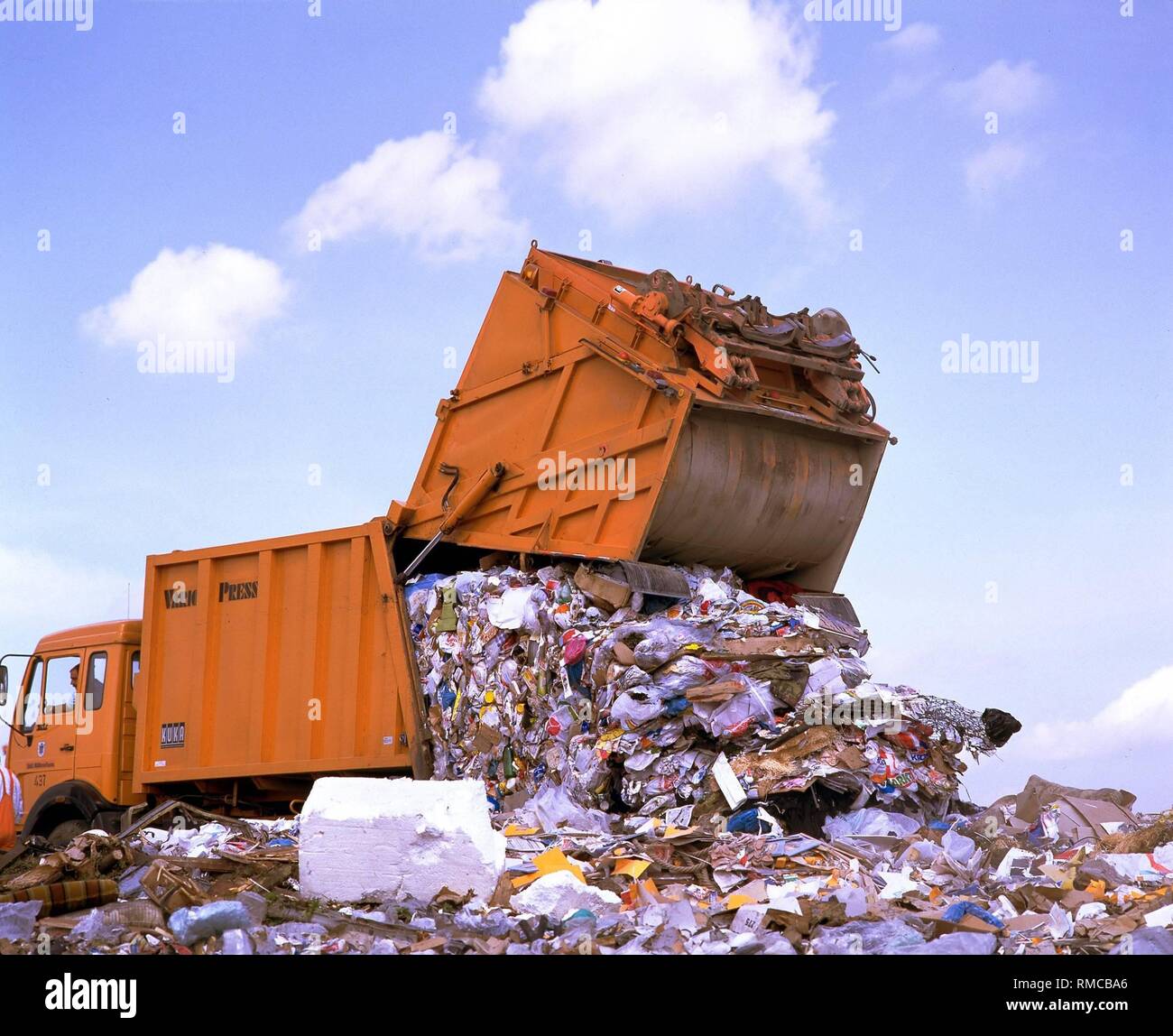 garbage-truck-unloading-waste-at-a-garbage-dump-in-north-rhine-westphalia-RMCBA6.jpg