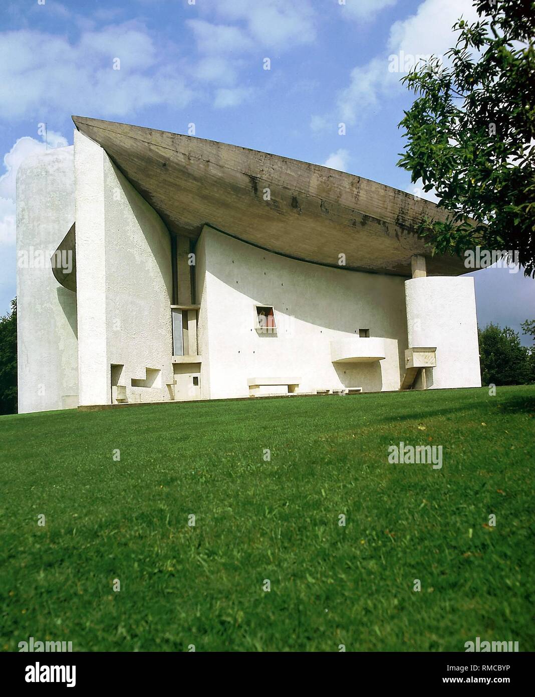The pilgrimage church "Notre-Dame-du-Haut" by Le Corbusier in Ronchamp in France. Stock Photo