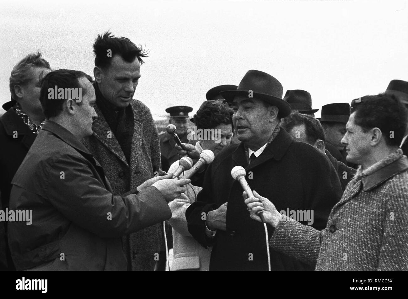 The General Secretary of the CPSU, Leonid Brezhnev, is being interviewed by journalists at the Erfurt Airport. Stock Photo