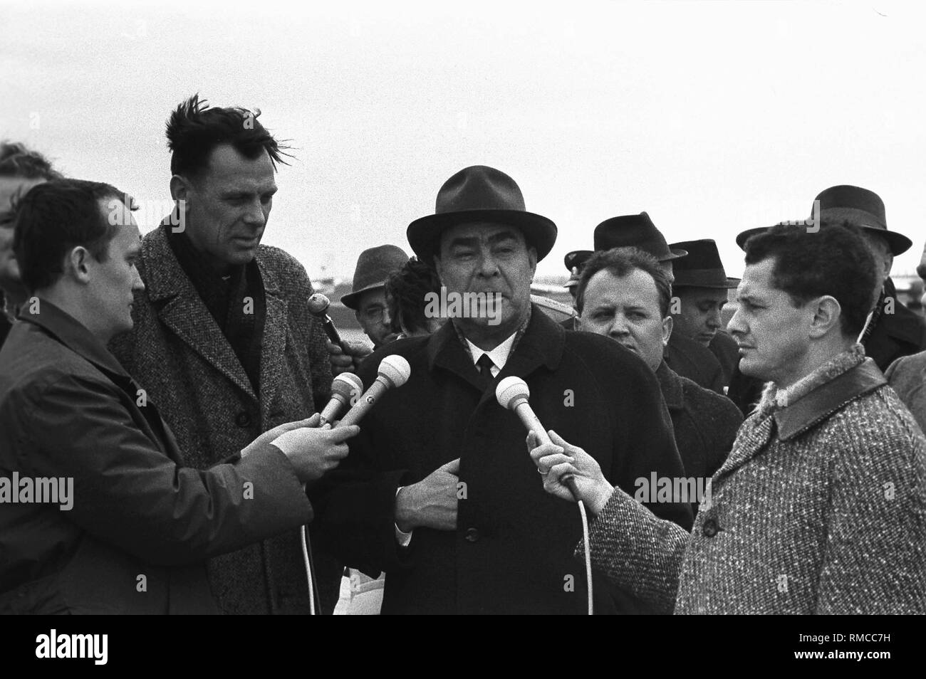 The General Secretary of the CPSU, Leonid Brezhnev, is being interviewed by journalists at the Erfurt Airport. Stock Photo