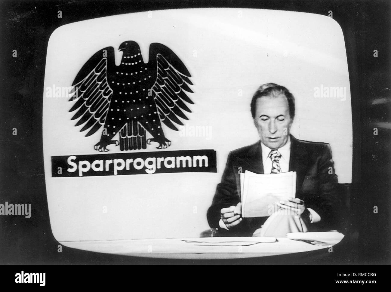 German television in the 70s: Newscaster Karl-Heinz Koepcke reports in the news about the austerity program of the Federal Government. Stock Photo