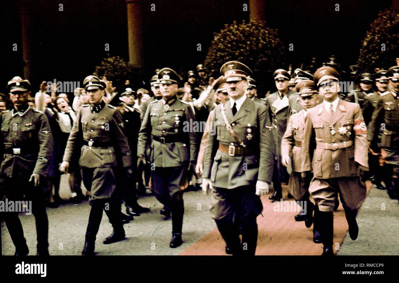 Adolf Hitler in Munich. The photo was taken when Mussolini visited Munich in 1940. On the left next to Hitler Field Marshal Wilhelm Keitel, in the front on the right, the Gauleiter of Munich Adolf Wagner, to the left behind Wagner, the Corps Leader of the NSKK Adolf Huehnlein, between Hitler and Huehnlein in the background, Foreign Minister Joachim von Ribbentrop, behind Hitler (hidden) Hermann Goering. On the left at the edge, the bodyguard of the SS. Stock Photo