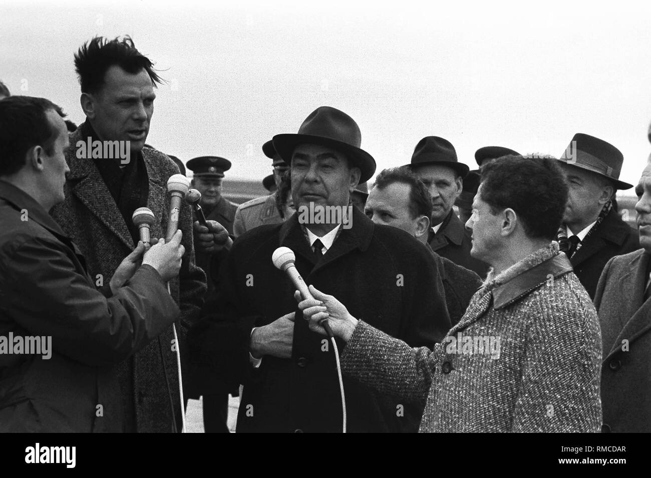 The General Secretary of the CPSU, Leonid Brezhnev, is being interviewed by journalists at Erfurt Airport. Stock Photo