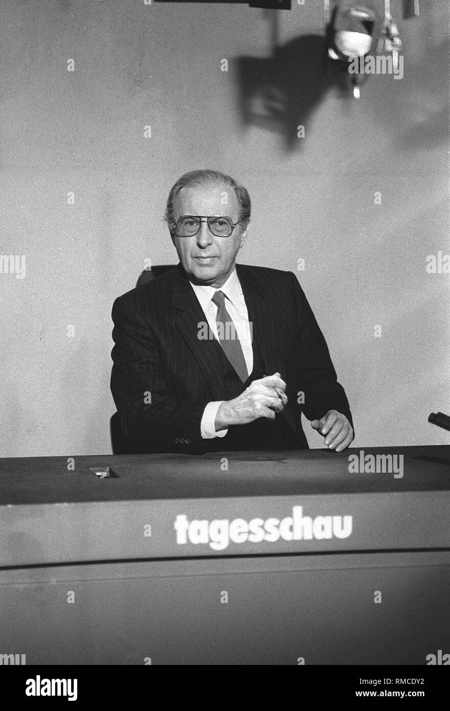 On December 25, 1952, the German television launched its triumphal march. 50 years of information and entertainment. Popular presenters and artists have become stars, even icons of electronic entertainment: Karl-Heinz Koepcke, Tagesschau veteran. Our photo shows him in 1983 in the Tagesschau studio. Stock Photo