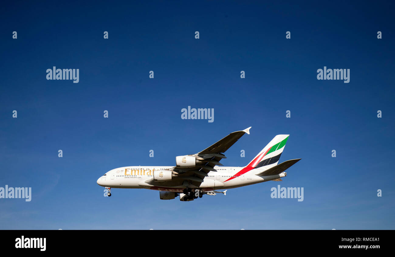 An Emirates Airbus A380 plane comes into land at Heathrow Airport from Dubai. Airbus has announced it will cease deliveries of its flagship A380 superjumbo passenger jet in 2021. Stock Photo