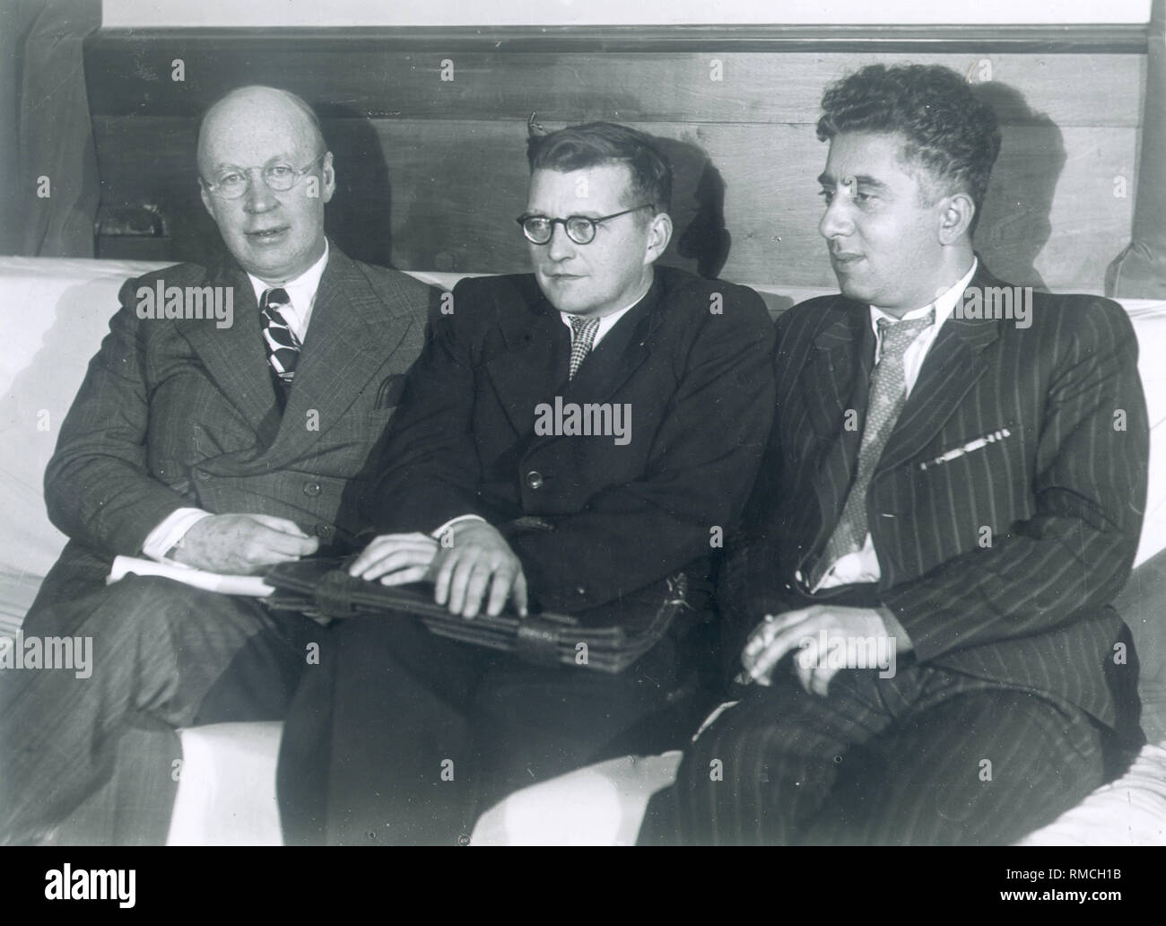 The Composers Sergei Prokofiev (1891-1953), Dmitri Shostakovich (1906-1975) and Aram Khachaturian (1903-1978). Photograph Stock Photo