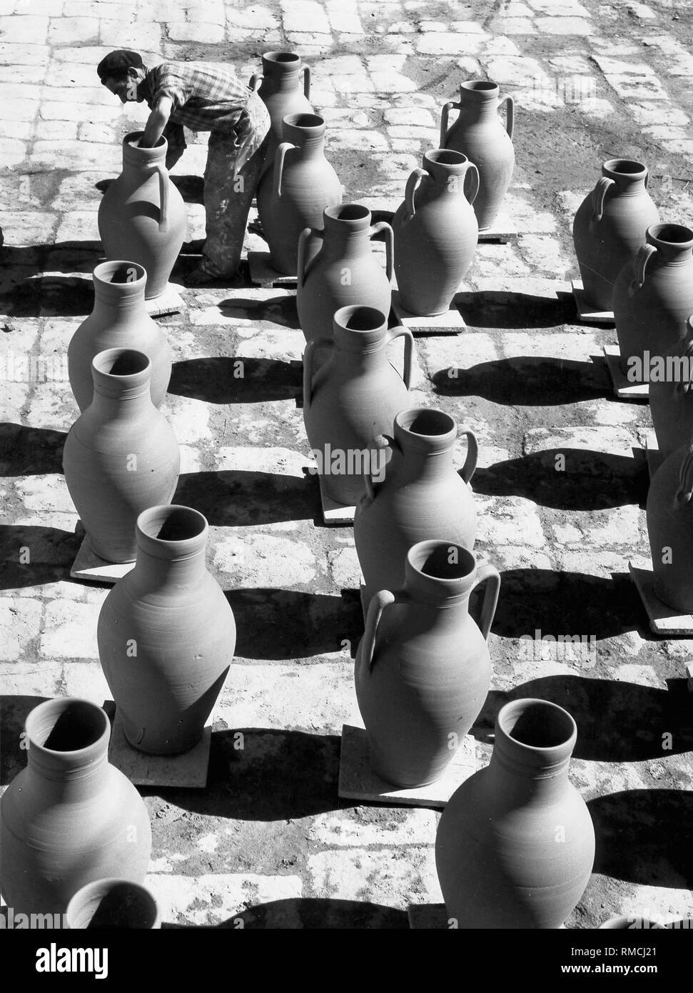 Pottery in the yard of a small pottery company in Puglia. Stock Photo