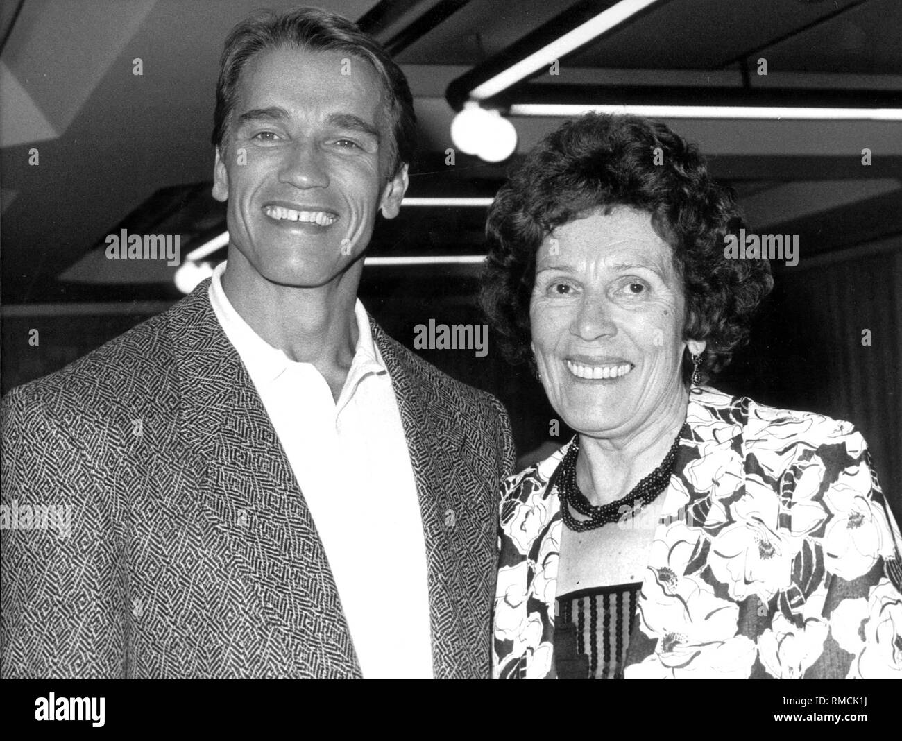 The bodybuilder and film actor Arnold Schwarzenegger with his mother Aurelia Schwarzenegger. Stock Photo