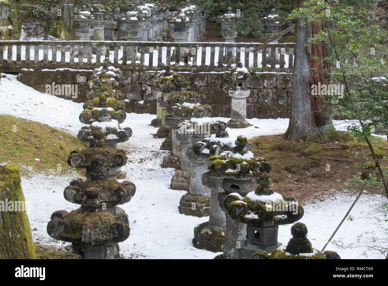 Stone Lanterns in the snow at Tosho-gu, Nikko, Japan Stock Photo
