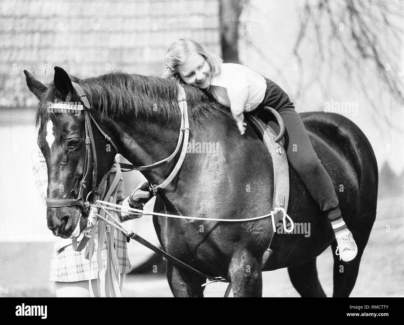 Angelika, a girl injured by Contergang, while riding. Stock Photo
