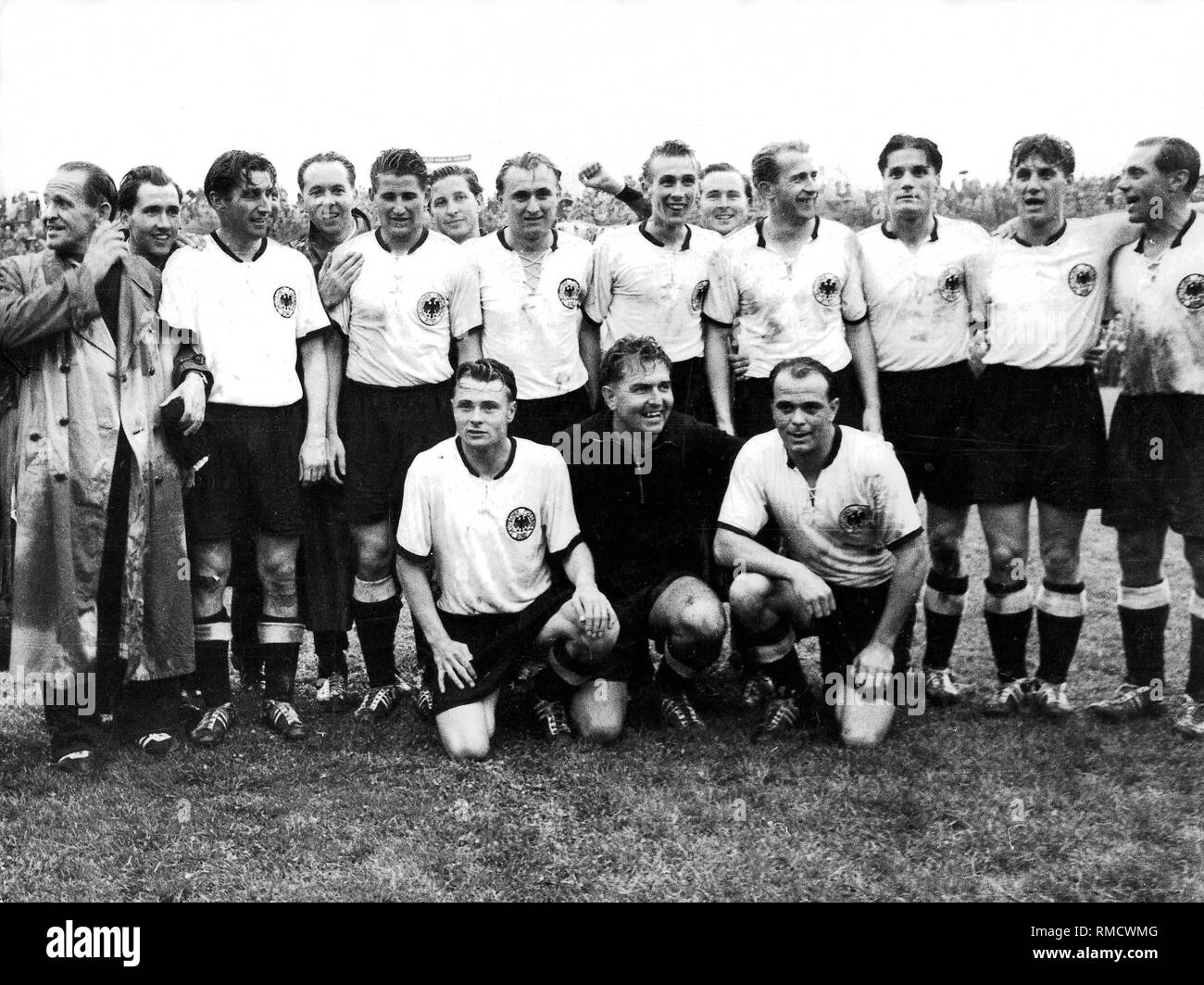 Germany is Football World Champion: At the 1954 FIFA World Cup in Bern, the  German national team won against Hungary with 3-2. The "Heroes of Bern"  from left: national coach Sepp Herberger,