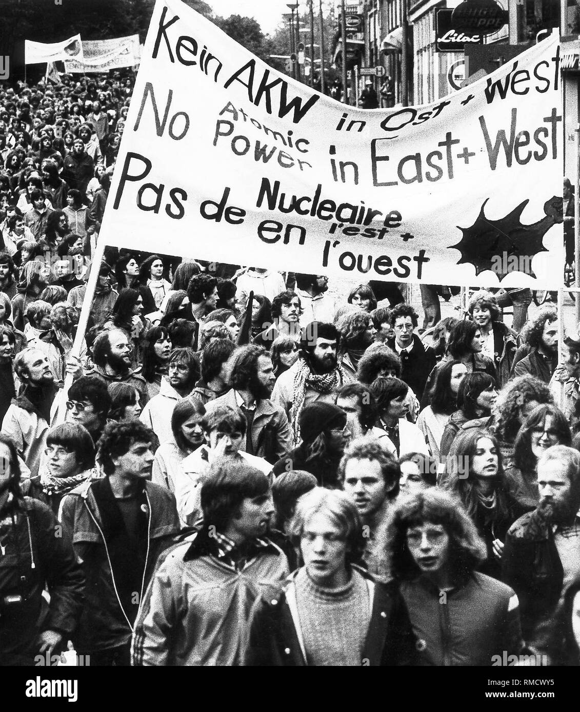 Demonstrators with banners at a demonstration of European nuclear opponents in Bremen, which took place on the occasion of the European Council meeting in Bremen on the same day. Stock Photo