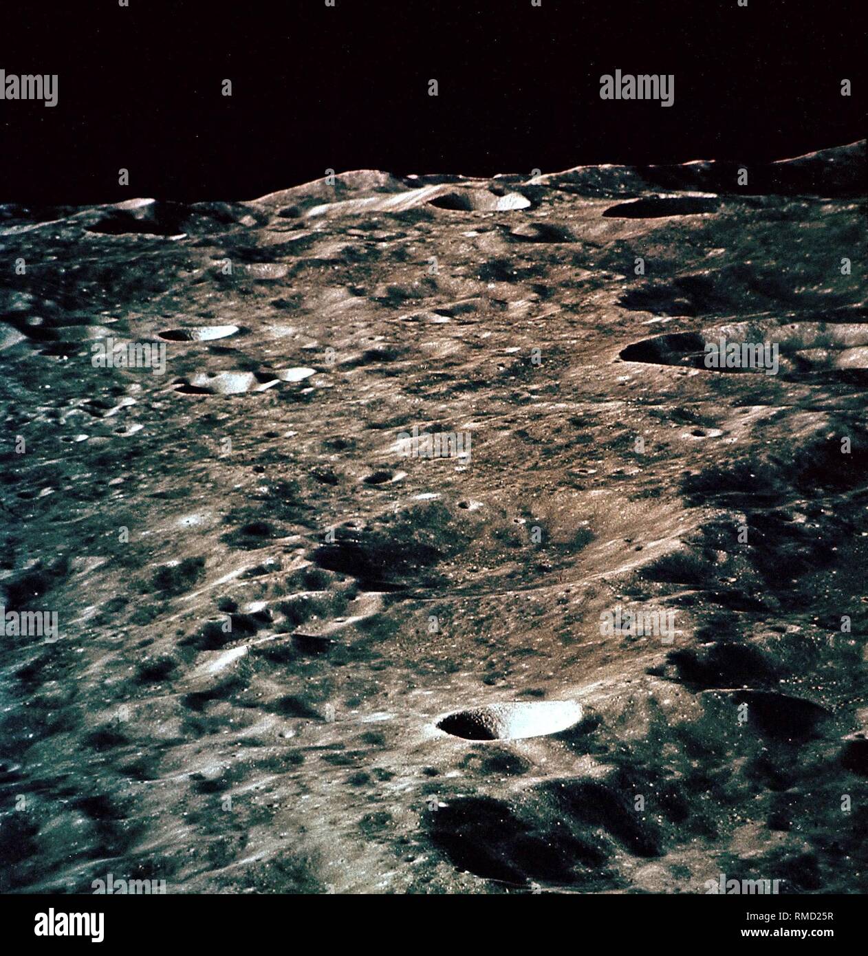 As part of the orbiting of the Moon of Apollo 10 (May 1969), this photo of the crater landscape on the far side of the Moon was taken by the lunar module 'Snoopy'. Stock Photo