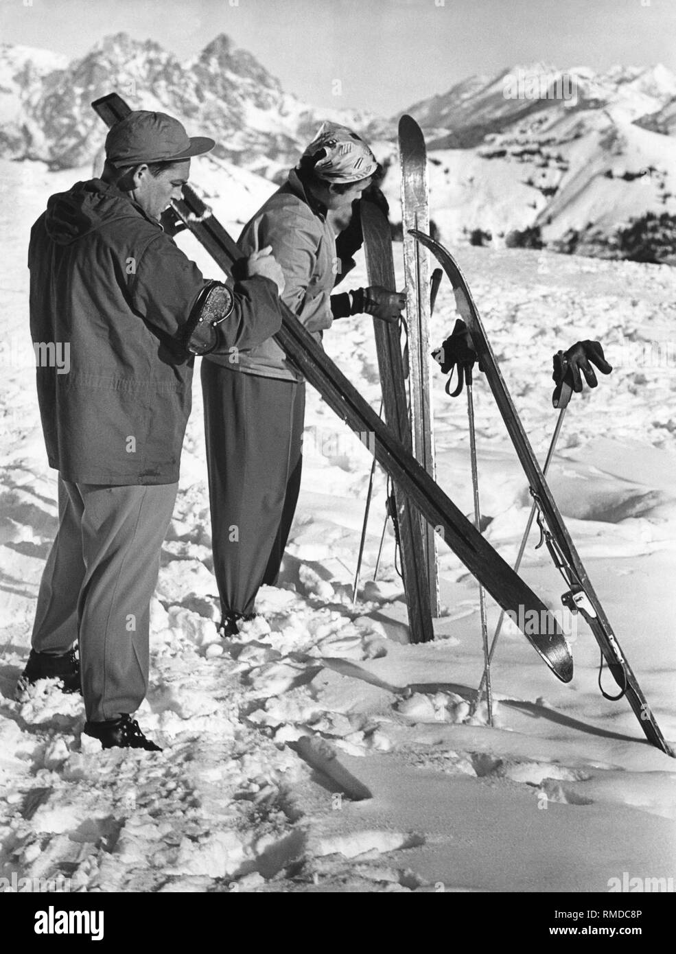 Waxing the skis, 50s Stock Photo