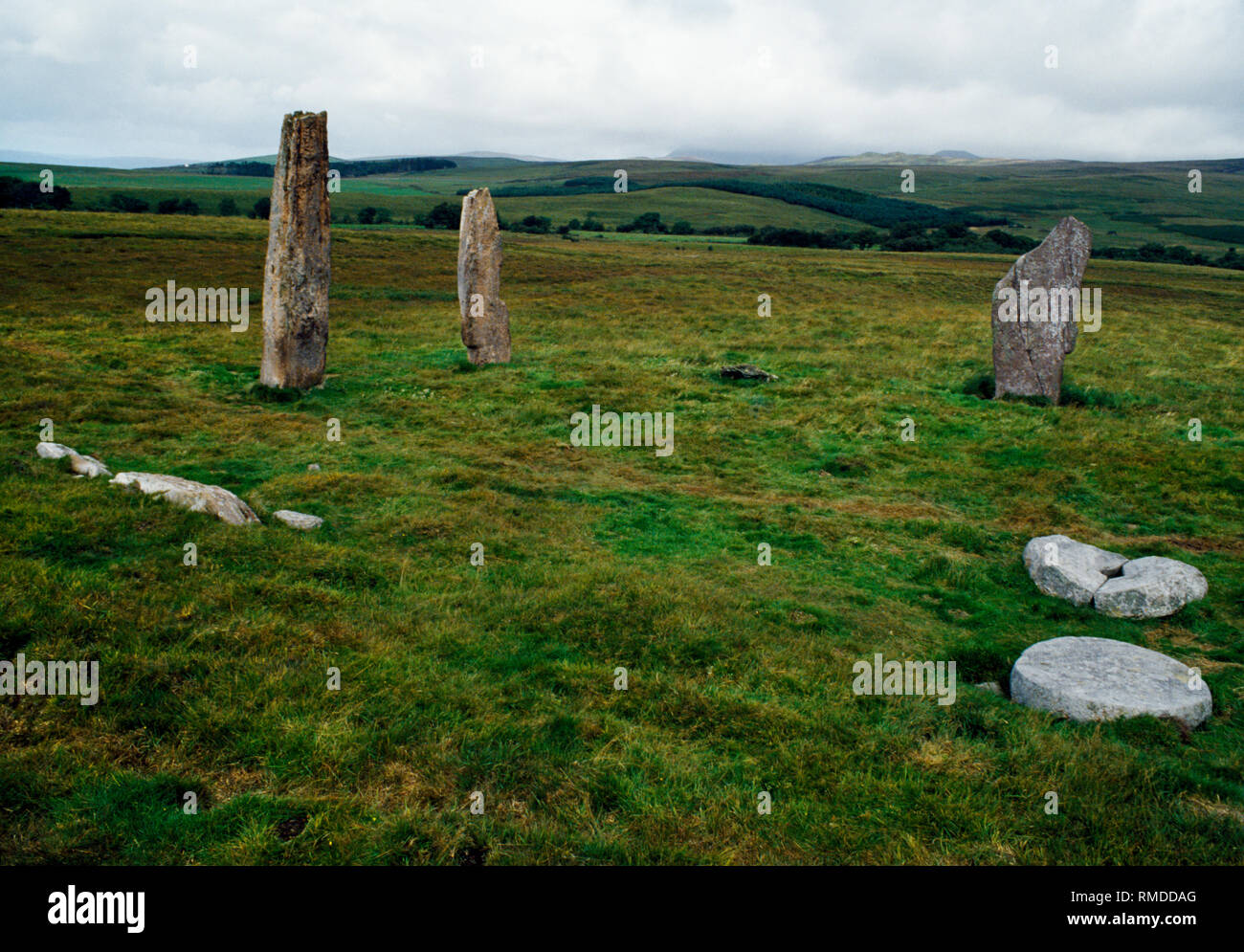 Machrie Moor stone circles, Arran, Scotland, UK: view N of the surviving sandstone pillars of Circle II with broken stumps & partly made millstones. Stock Photo