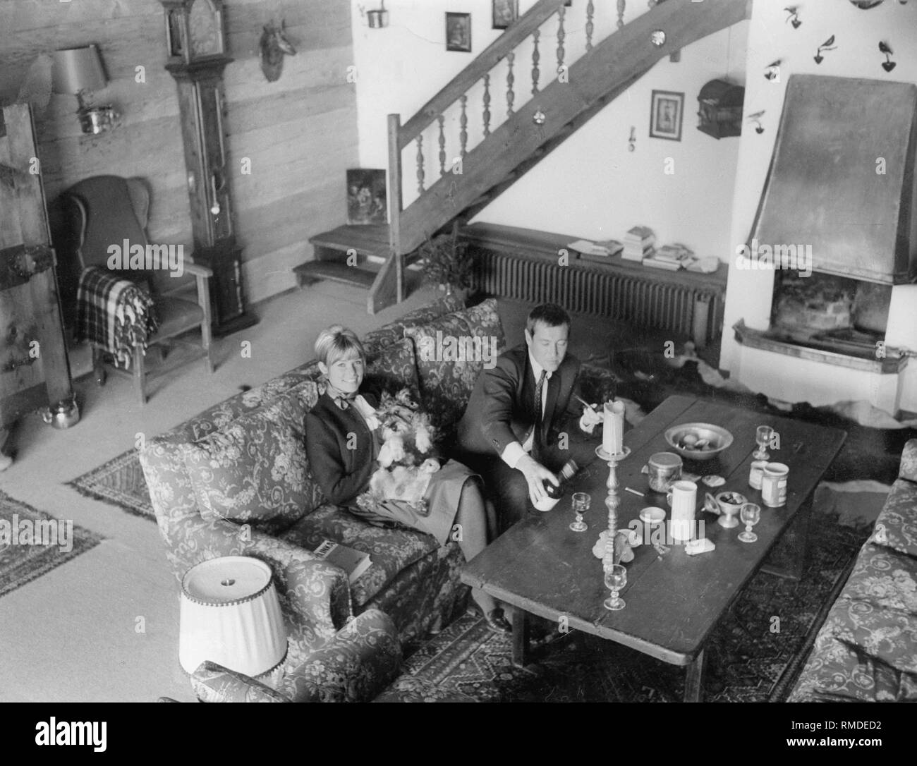 Dietmar Schoenherr and his wife Vivi Bach in the living room of their farm near Salzburg. Stock Photo
