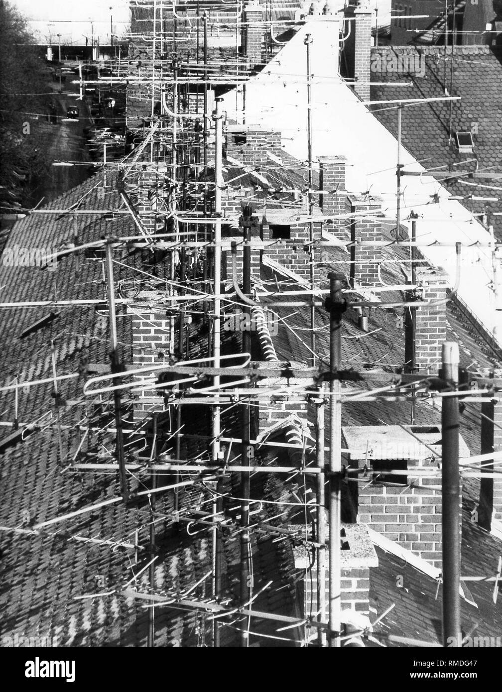Antennas on a house roof Stock Photo Alamy