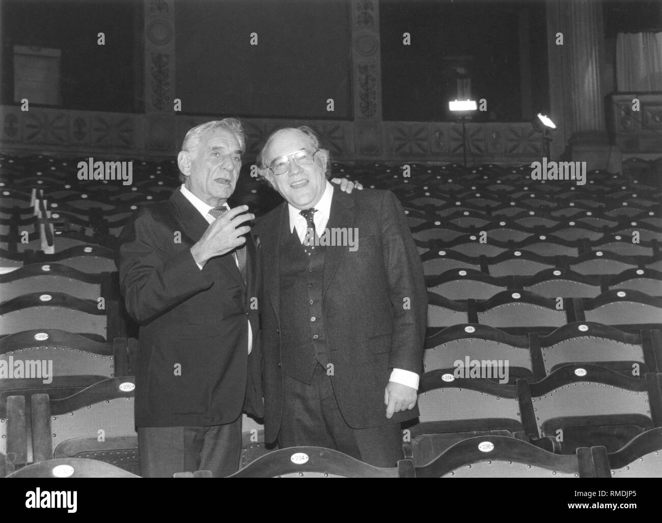 The American composer Leonard Bernstein with the German director August Everding. Stock Photo