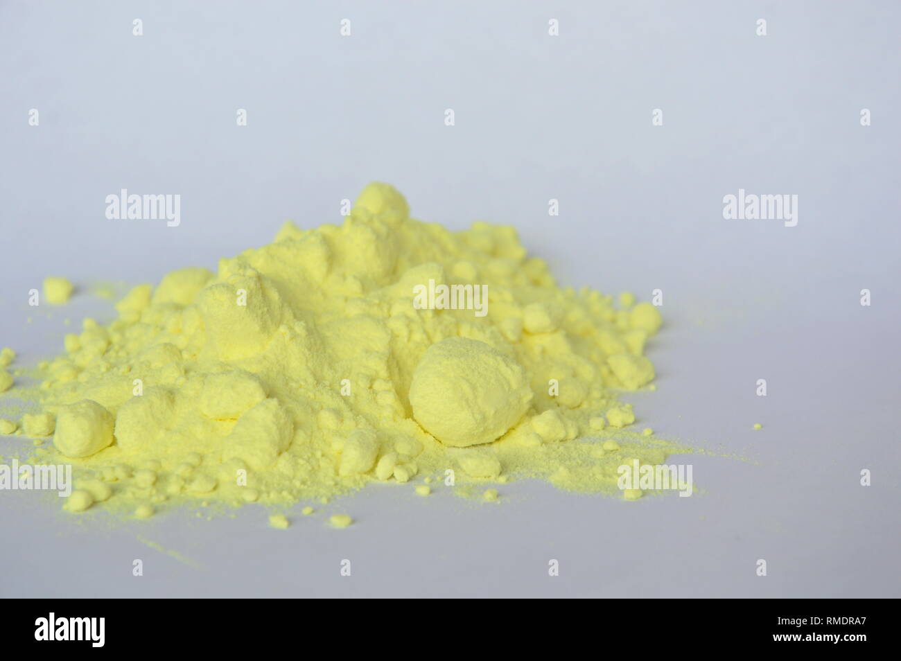 sulfur powder on white background Stock Photo Alamy