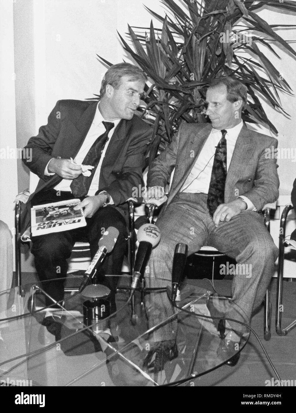National coach Berti Vogts (right) is in a discussion at the Studio Bruckmann, moderator is the editor-in-chief of the 'Kicker' Rainer Holzschuh (left). Stock Photo