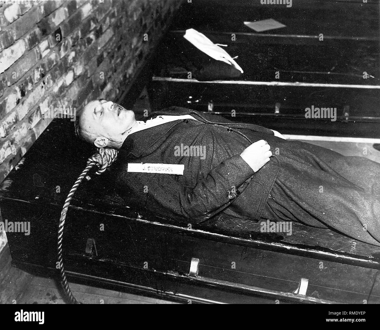 Gauleiter Julius Streicher after his execution by hanging on October 16, 1946 in Nuremberg (Nuremberg trials). Stock Photo