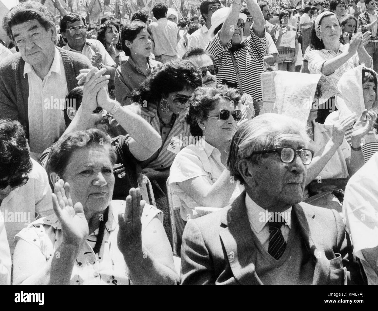Spectators at an event of left-wing parties, which demand the resignation of General Augusto Pinochet. Stock Photo