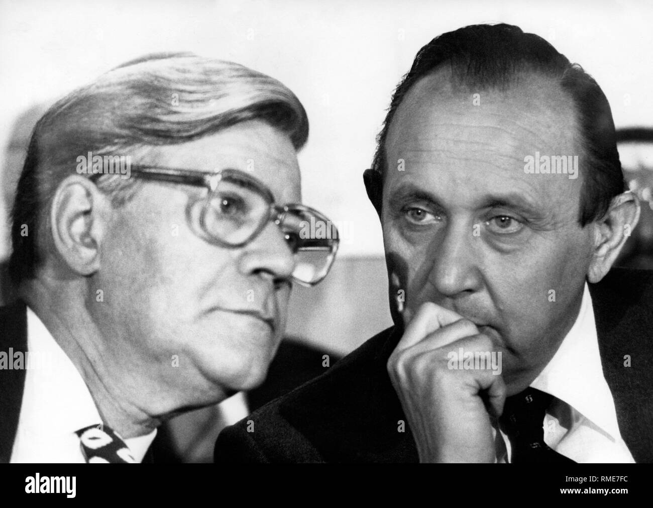 Chancellor Helmut Schmidt (left with glasses) with Foreign Minister