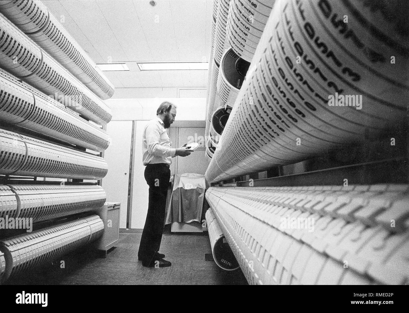 An employee in the archive room with stored EDV tapes at the Bundeswehr University. Stock Photo