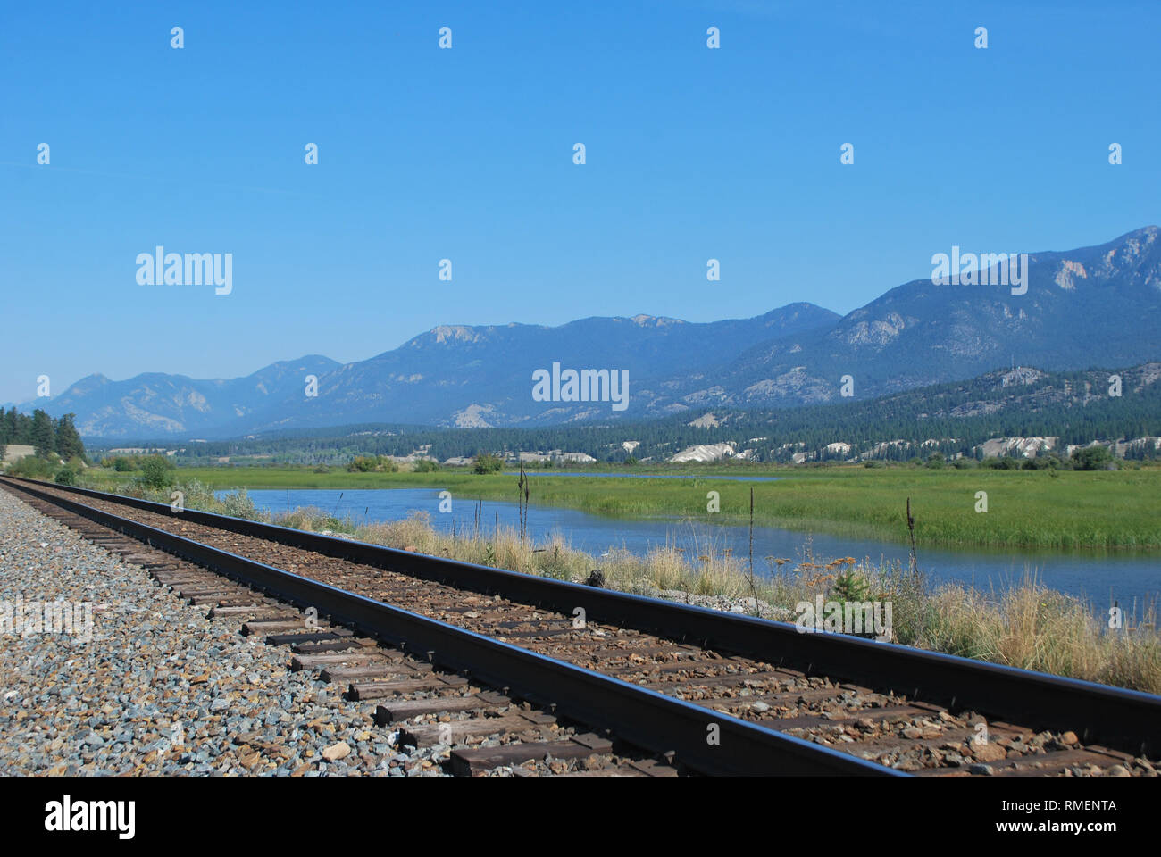 The CPR line winding through the Columbia River wetlands in southeastern British Columbia. Stock Photo
