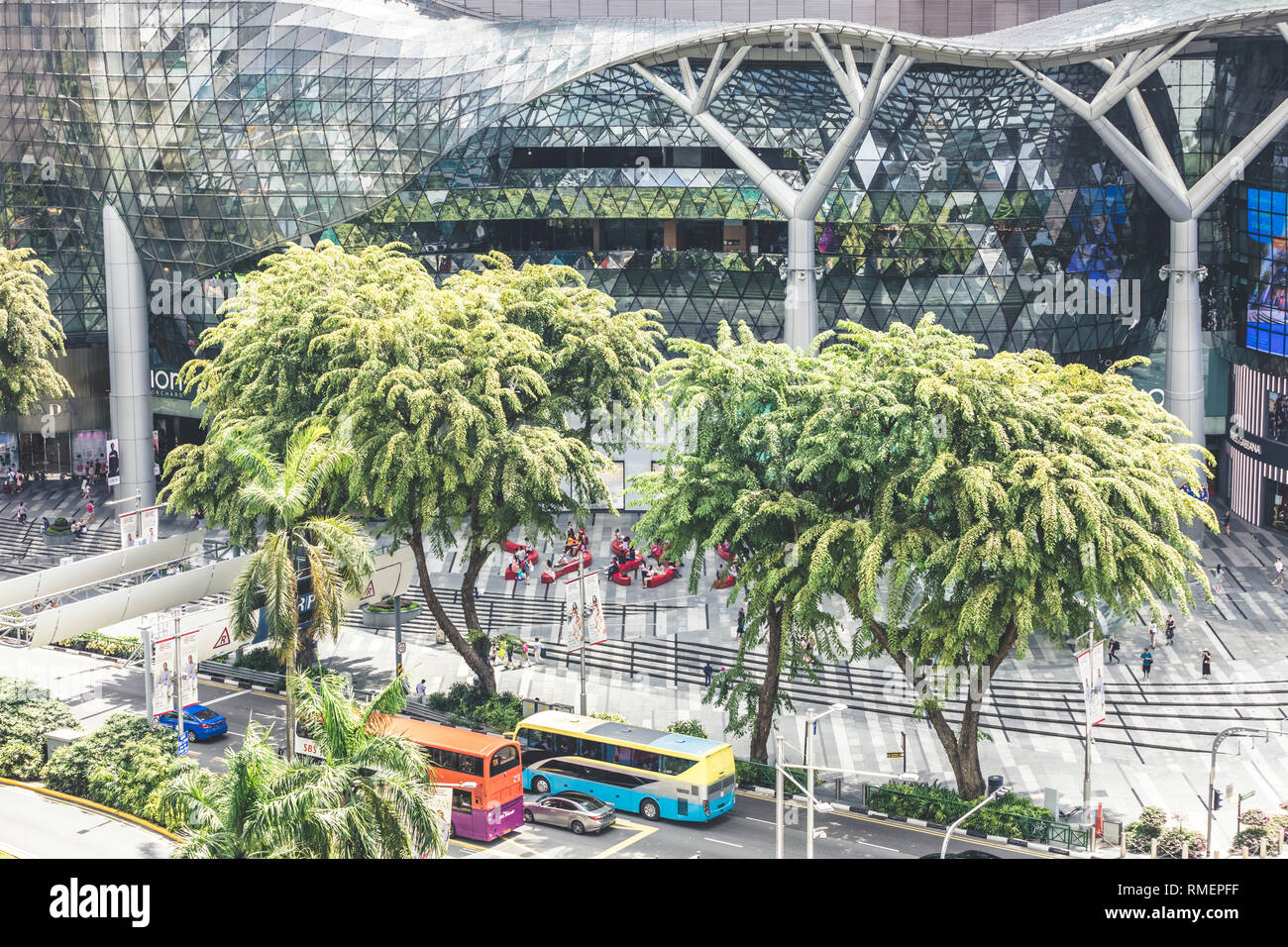 Singapore / Singapore - February 10 2019: Aerial close up view of Ion Orchard shopping mall exterior and Orchard Road street during day time Stock Photo
