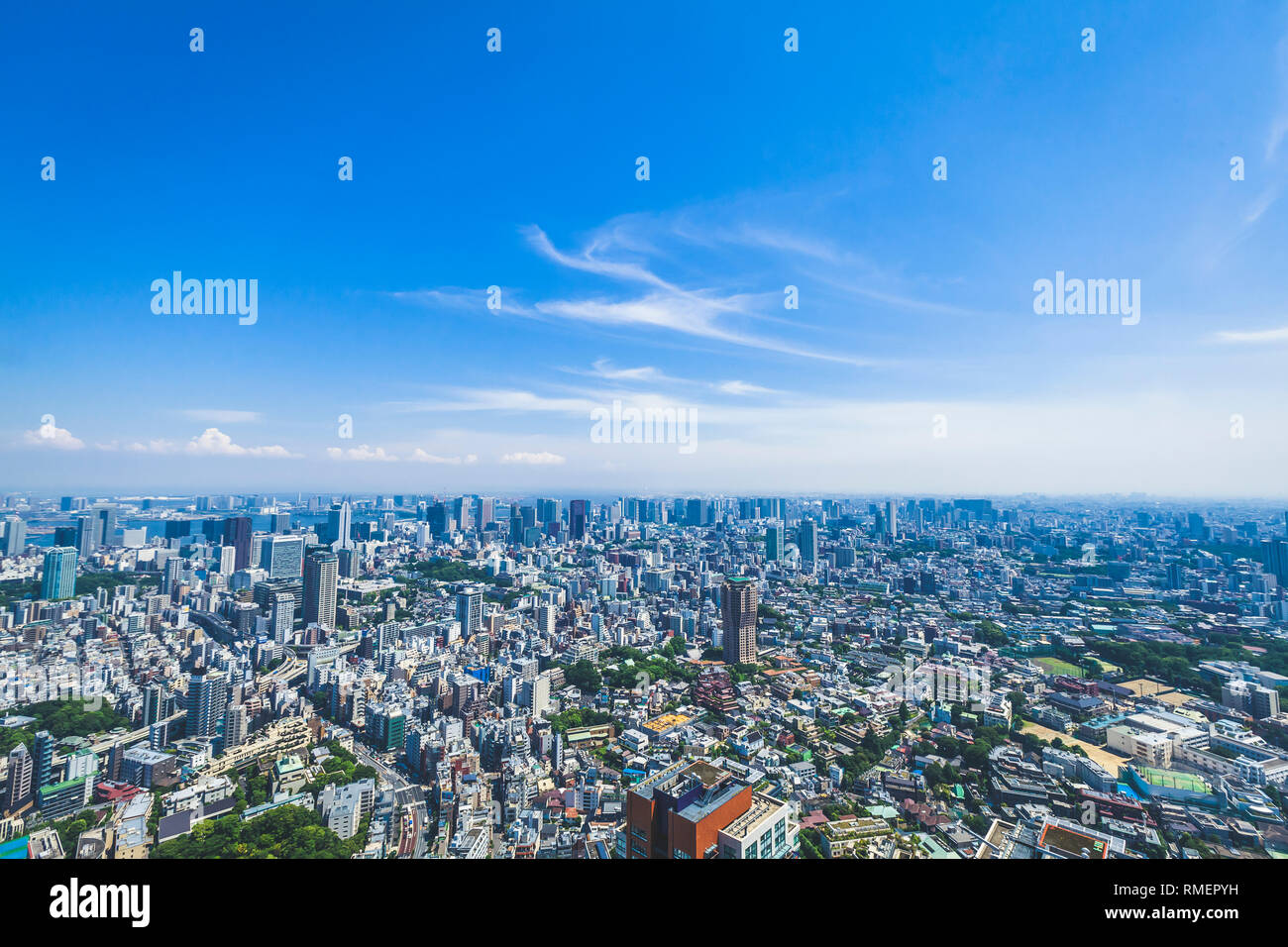 Tokyo / Japan - June 16 2017: Tokyo city building urban landscape aerial view from Roppongi Hills day time clear weather Stock Photo