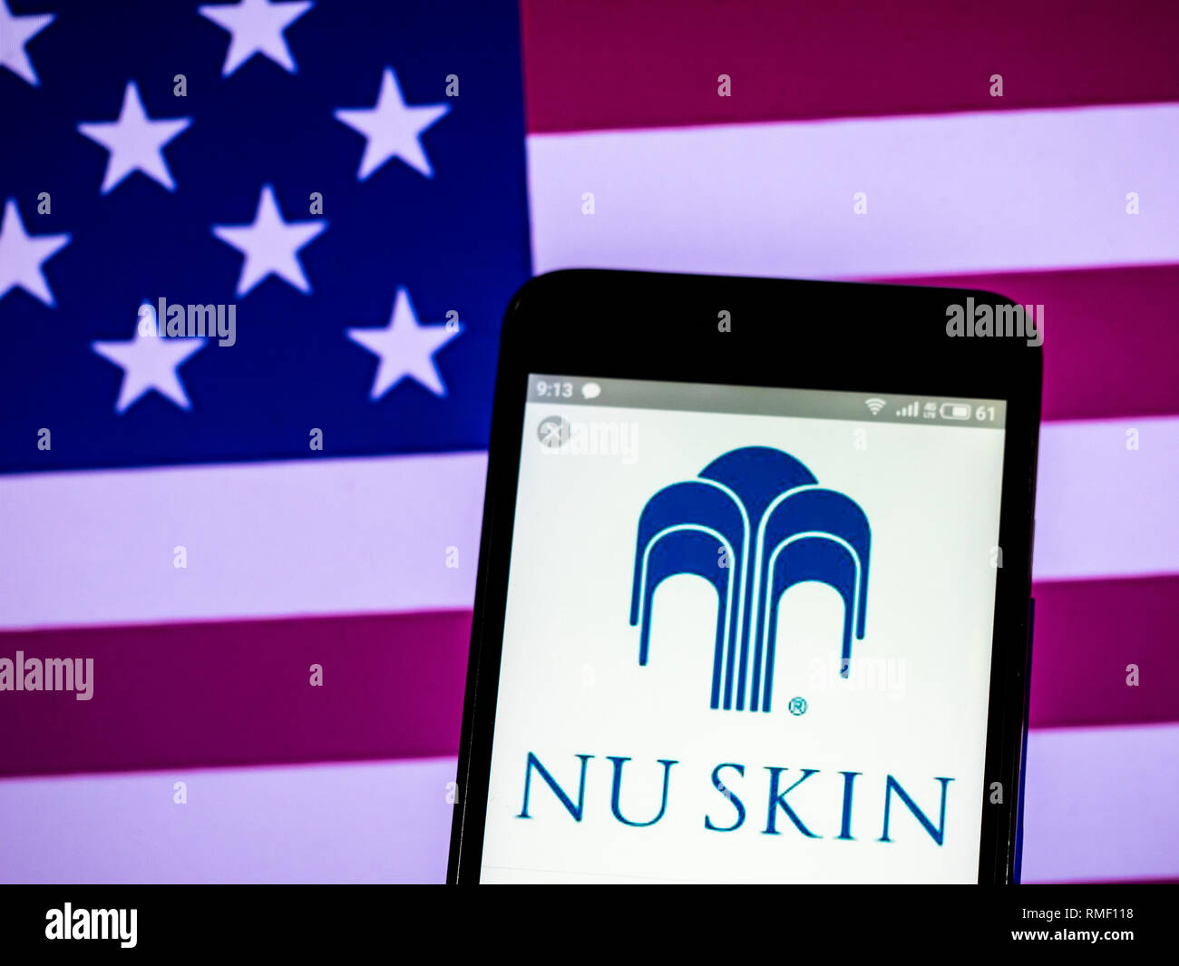 Nu Skin Enterprises company  logo seen displayed on smart phone Stock Photo