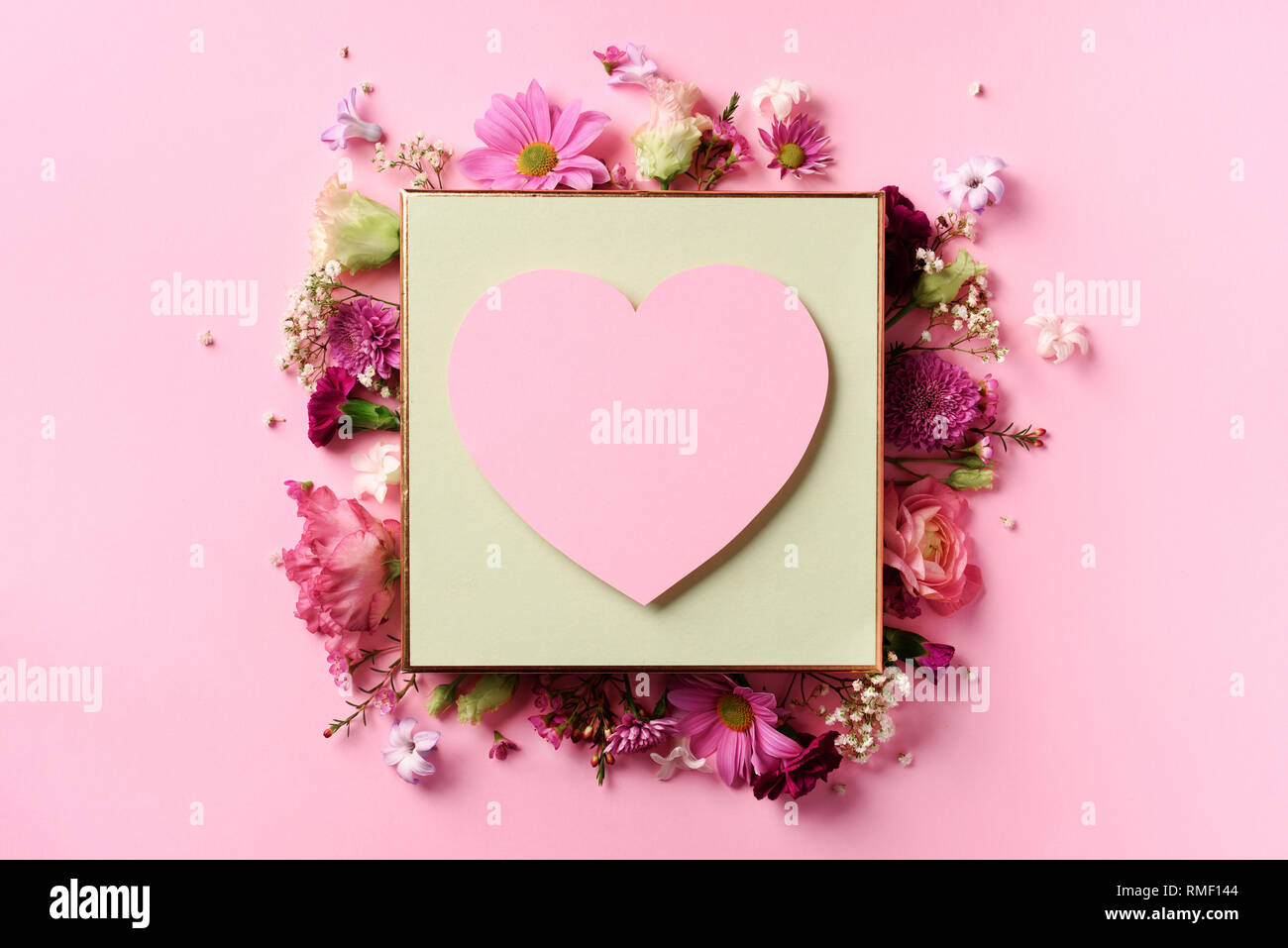 Frame of pink flowers over punchy pastel background. Valentines day, Woman  day concept. Spring or summer banner with copy space Stock Photo - Alamy, image size:1300x957