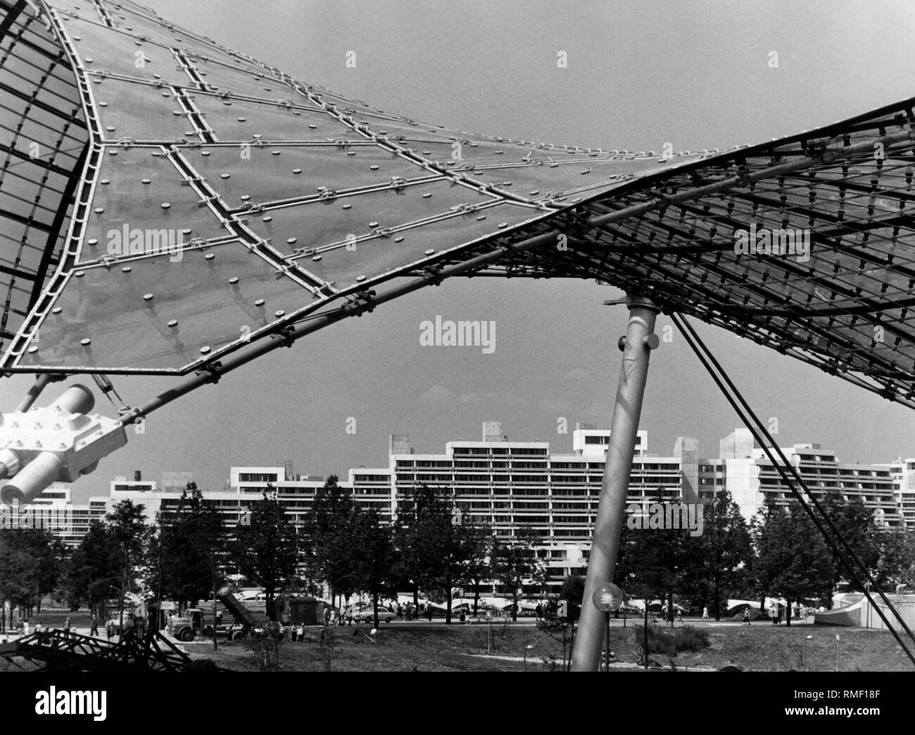 Behind the tent roof on the Munich Olympic grounds extends the Olympic Village. Stock Photo