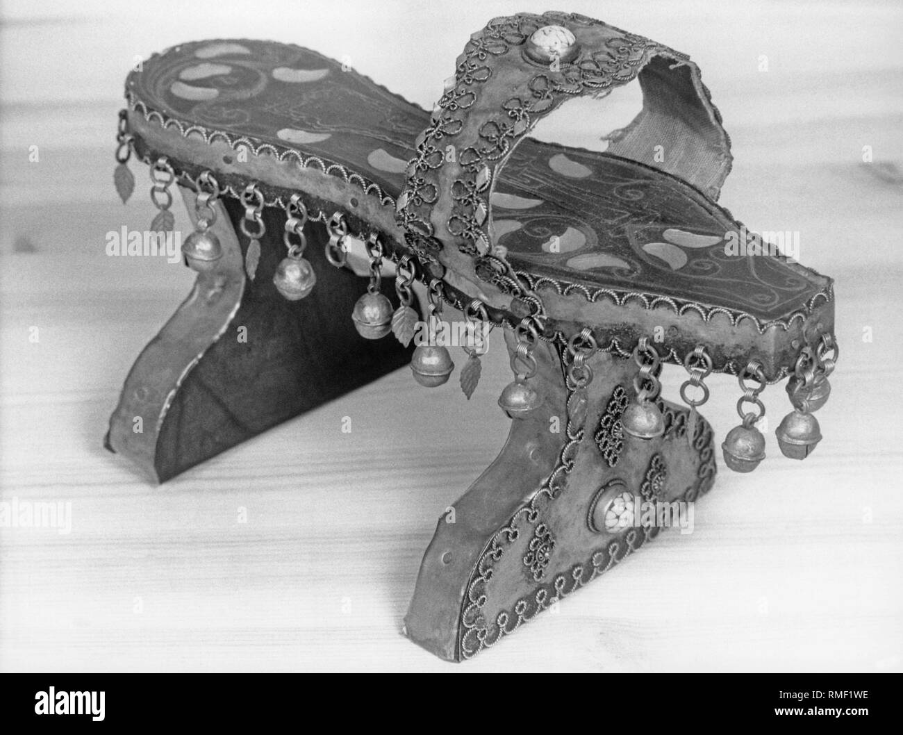 A bathing shoe from Turkey decorated with real turquoise and bells. The shoe comes from the collection of Ernst Tillmann from Viersen-Suechteln near Moenchengladbach. Stock Photo