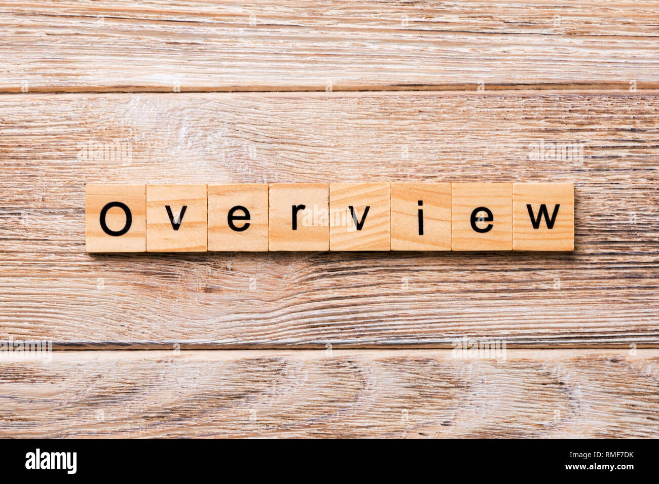 OVERVIEW word written on wood block. OVERVIEW text on wooden table for ...