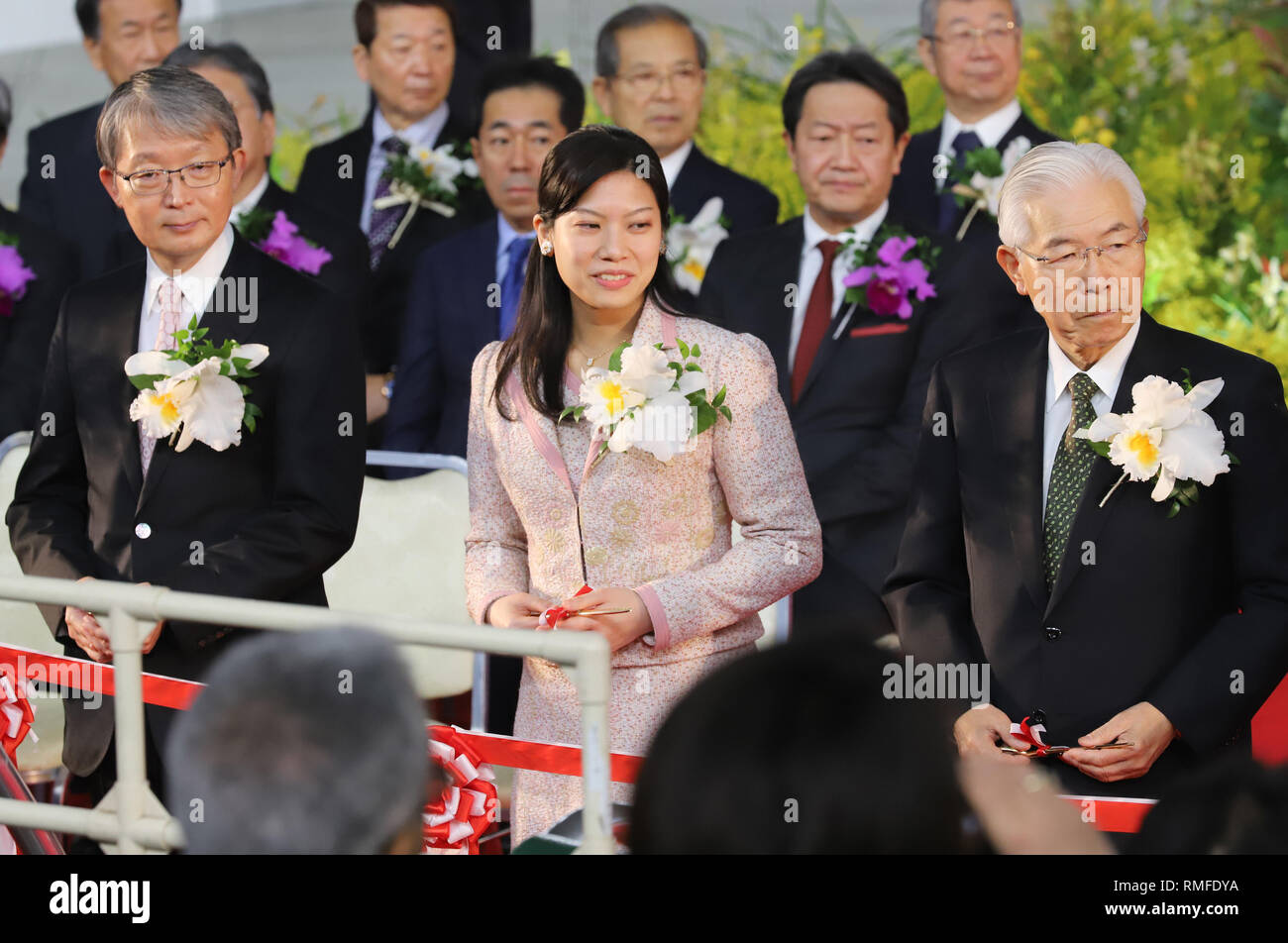Tokyo, Japan. 15th Feb, 2019. Noriko Senge (C), the second daughter of Princess Takamado, accompanied by Yomiuri Shimbun Holdings chairman Kojiro Shiraishi (R) and Yomiuri president Toshikazu Yamaguchi (L) cuts a ribbon at the opening ceremony for 'JGP International Orchid and Flower Show' at the Tokyo Dome stadium in Tokyo on Friday, February 15, 2019. The annual flower festival with 3,000 types, 100,000 plants orchids will be held from February 15 through 22. Credit: Yoshio Tsunoda/AFLO/Alamy Live News Stock Photo
