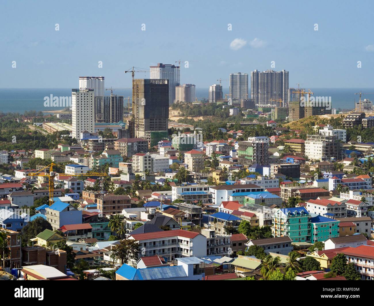 Sihanoukville, Preah Sihanouk, Cambodia. 15th Feb, 2019. Construction sites for Chinese resorts and casinos rise over downtown Sihanoukville. There are about 80 Chinese casinos and resort hotels open in Sihanoukville and dozens more under construction. The casinos are changing the city, once a sleepy port on Southeast Asia's ''backpacker trail'' into a booming city. The change is coming with a cost though. Many Cambodian residents of Sihanoukville have lost their homes to make way for the casinos and the jobs are going to Chinese workers, brought in to build casinos and work in the casin Stock Photo
