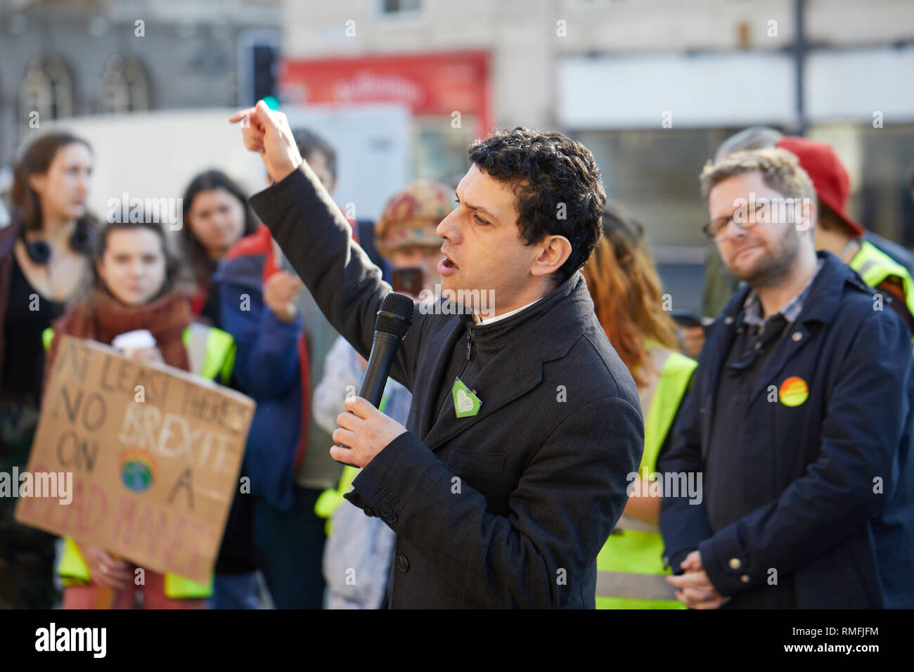 Leeds, UK. 15th Feb, 2019. Alex Sobel MP (Labour, Leeds North West) speaking outside the city hall to a group of young protestors during a national climate change strike day of action. Credit: Kevin J. Frost/Alamy Live News Stock Photo